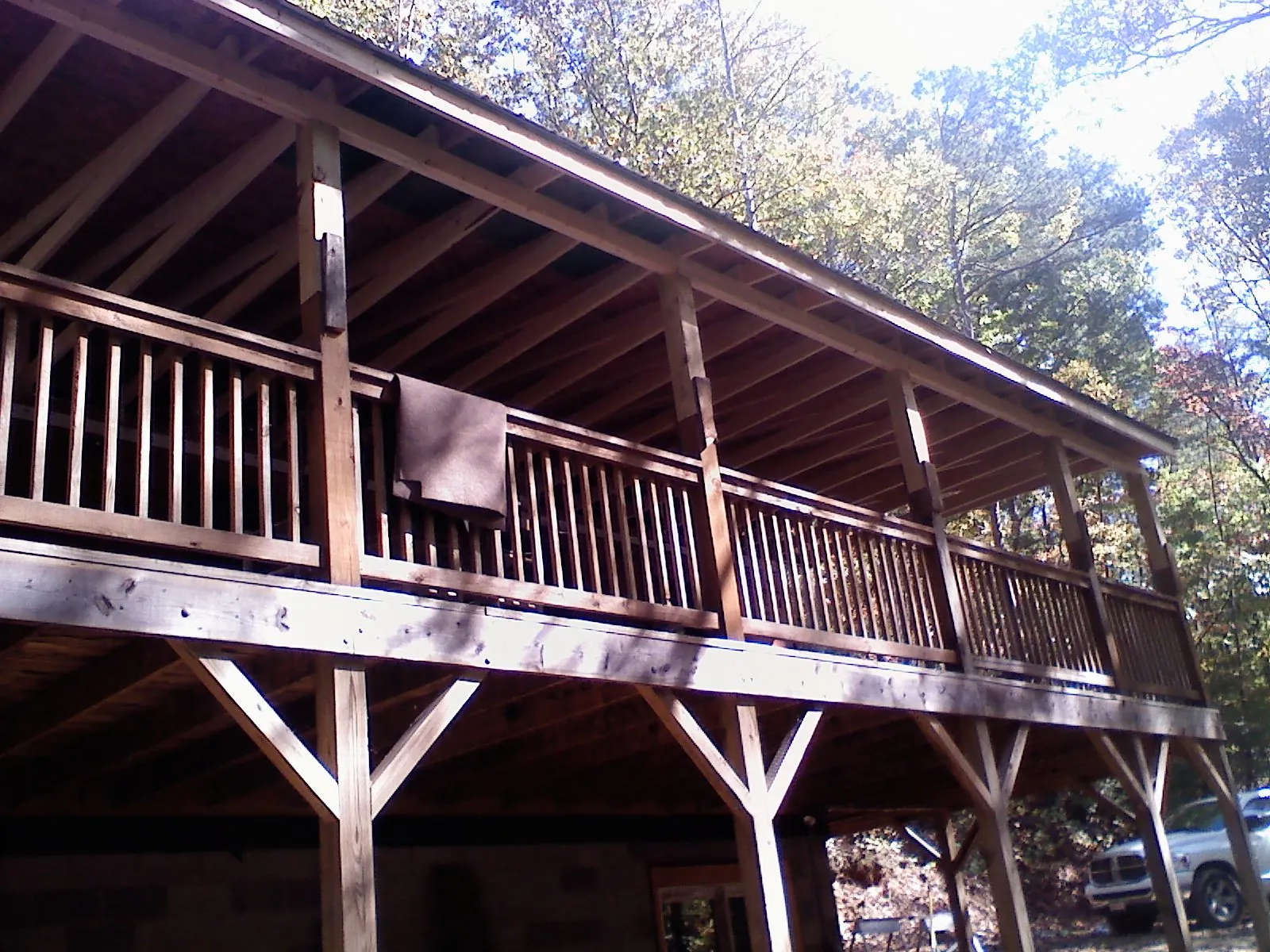 Timber framing under a new elevated porch and deck — Roof Leak Repair in Moundville by Roofing Brothers